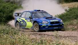 Subaru  - Impreza WRC 2004 blue/yellow - 1:18 - SunStar - 4369 - sun4369 | The Diecast Company