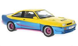 Opel  - Manta B 1991 yellow/blue - 1:18 - MCG - 18095 - MCG18095 | The Diecast Company