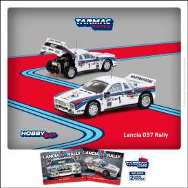 Lancia  - 037 Rally 1983 white/red/blue - 1:64 - Tarmac - T64P-TL002-83RMC01 - TC-T64P-TL002-83RMC01 | The Diecast Company